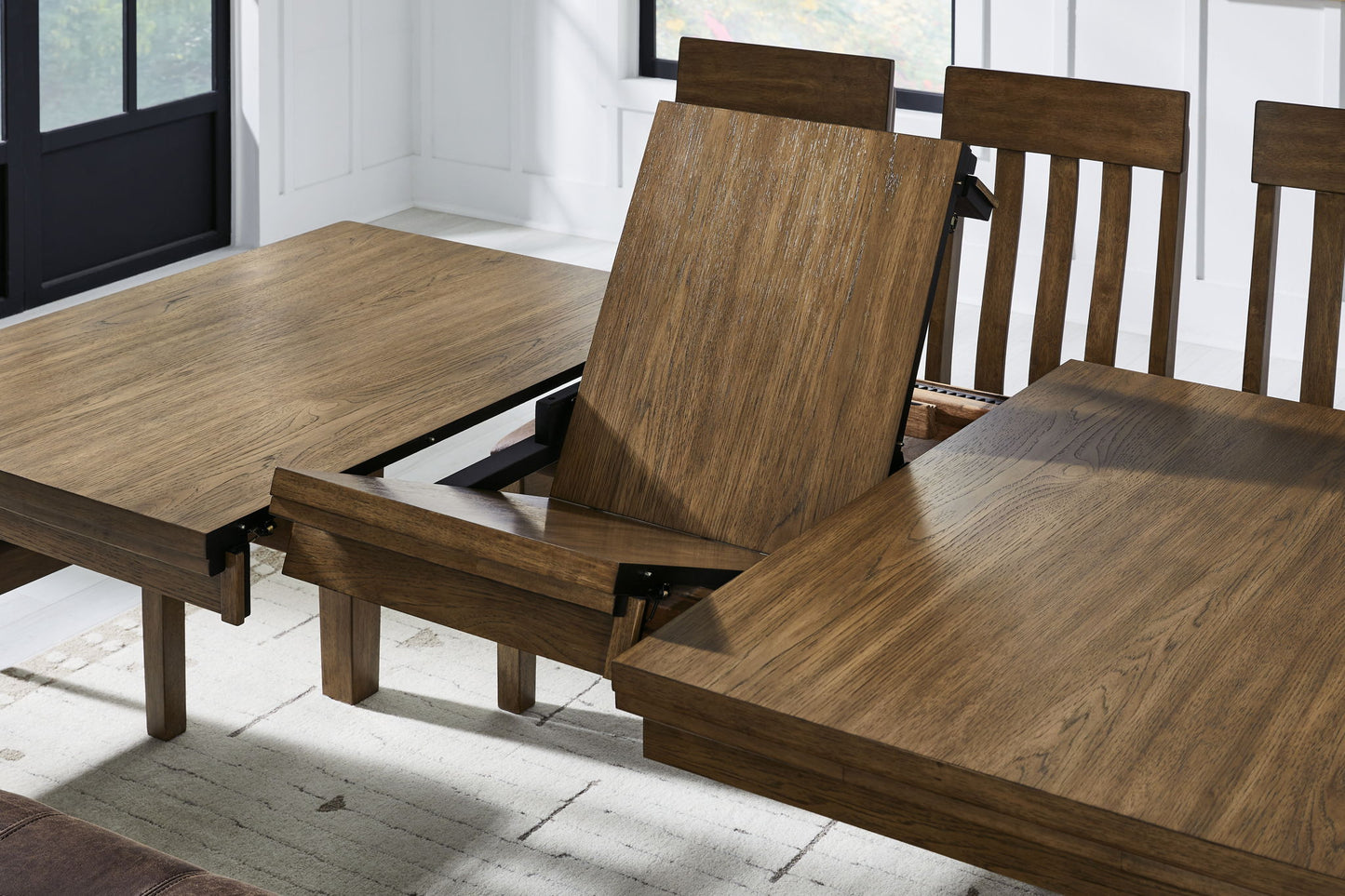 Urbinforte - Dining Room Butterfly Extension Table - Light Brown