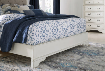 Blendon - Queen Upholstered Panel Bed - Rustic Brown